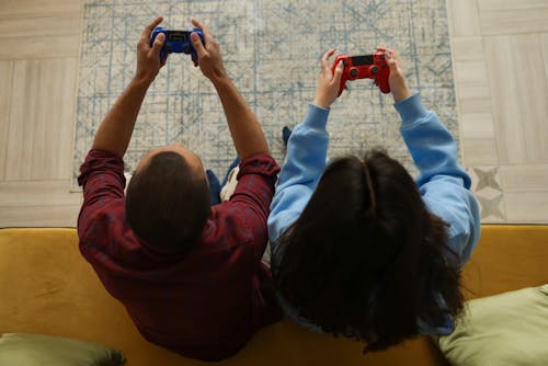 Top View of a Man and Woman Playing Video Game