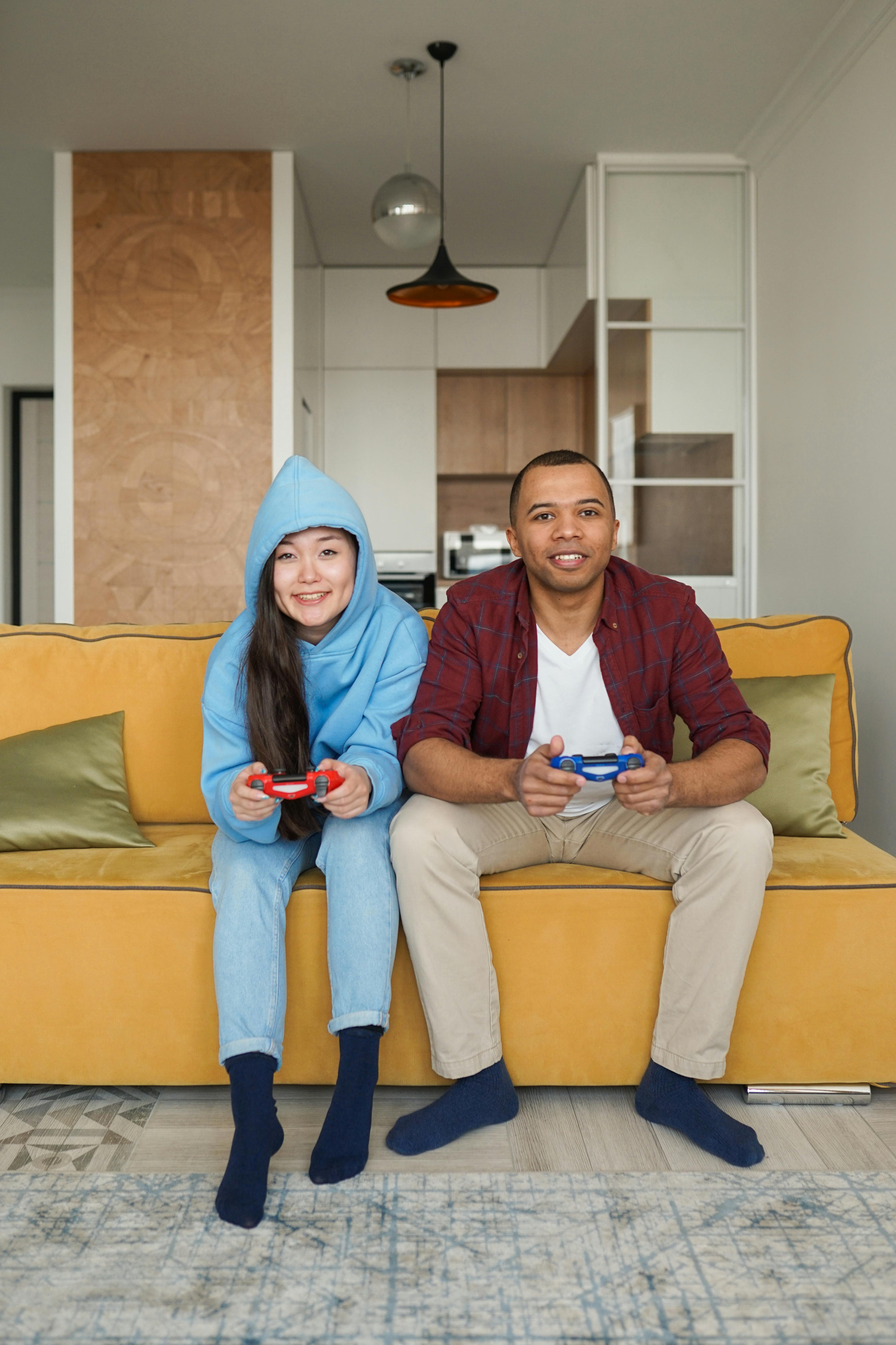 a man and woman playing video game
