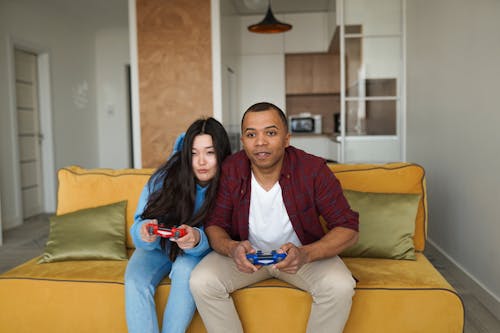 Free A Couple Playing Video Games Stock Photo