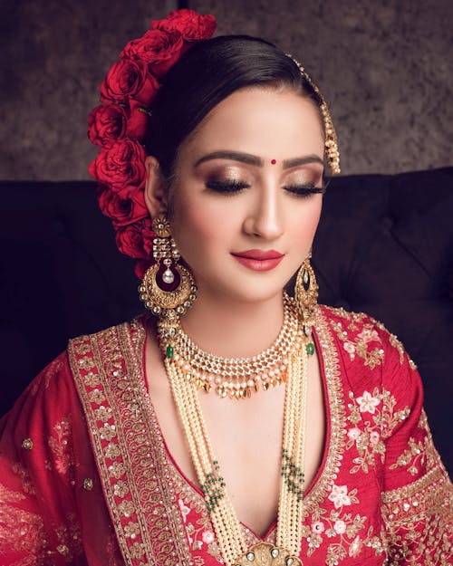 Woman in Red and Gold Dress