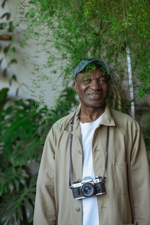 Photo of Old Man Wearing Beige Jacket Free Stock Photo