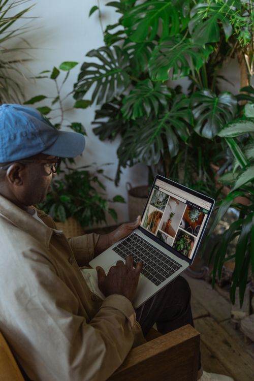 Person using laptop to search for cable operator contact details — Photo by Ron Lach on Pexels