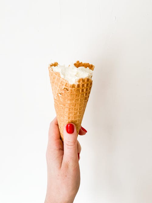 A Person Holding an Ice Cream Cone