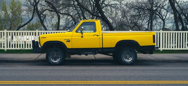 Pickup truck parked on a city street — photo by Andrew LaBonne on Pexels