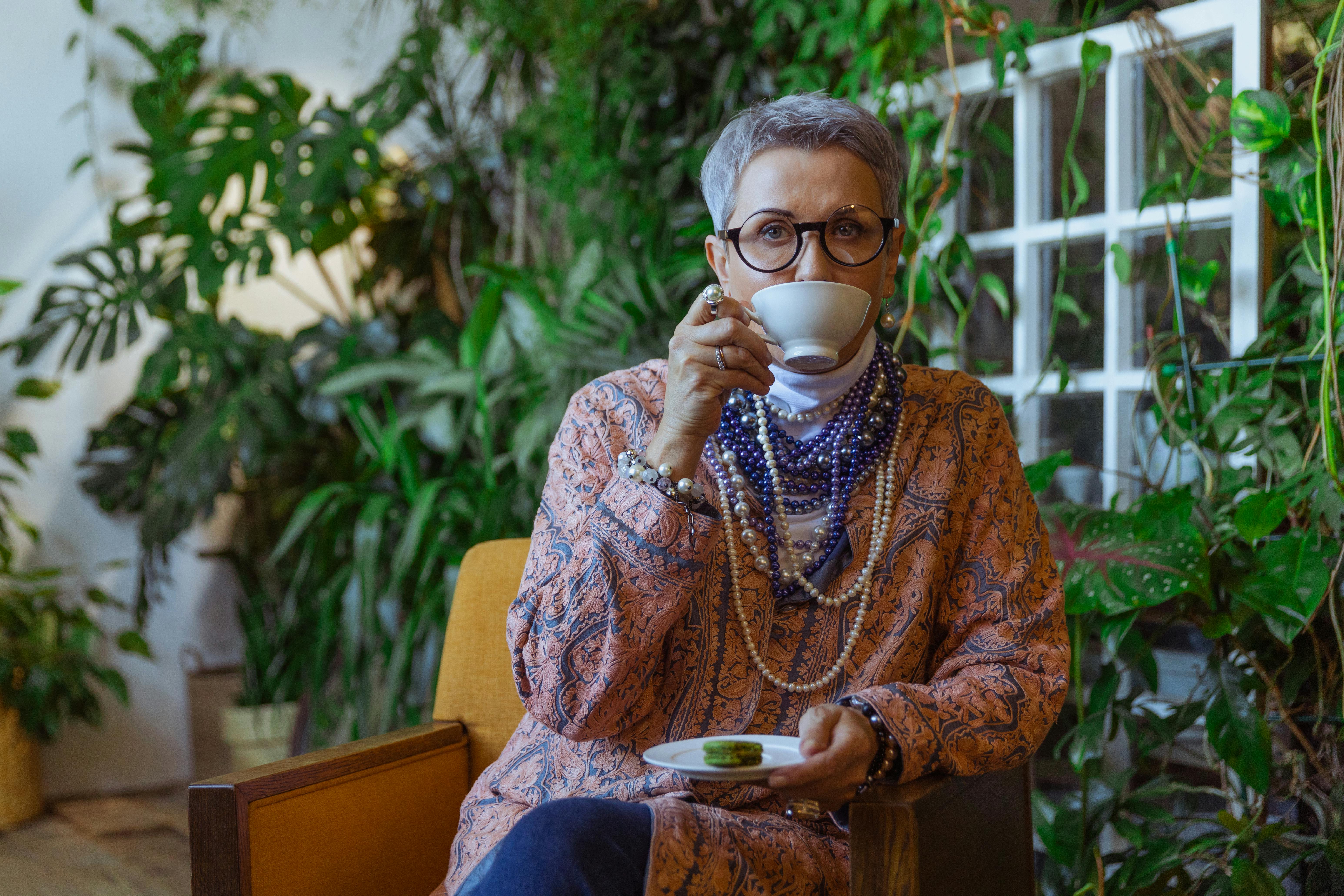 photo of woman drinking coffee