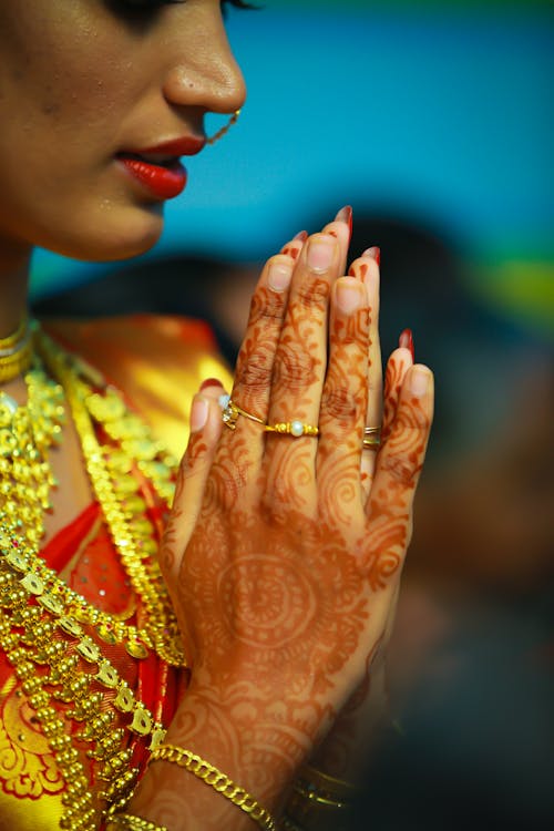 Free Woman in Gold and Red Sari Stock Photo