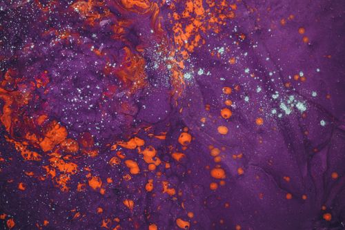 Free Dynamic abstract artwork showcasing vibrant purple and orange swirls with fluid textures. Stock Photo