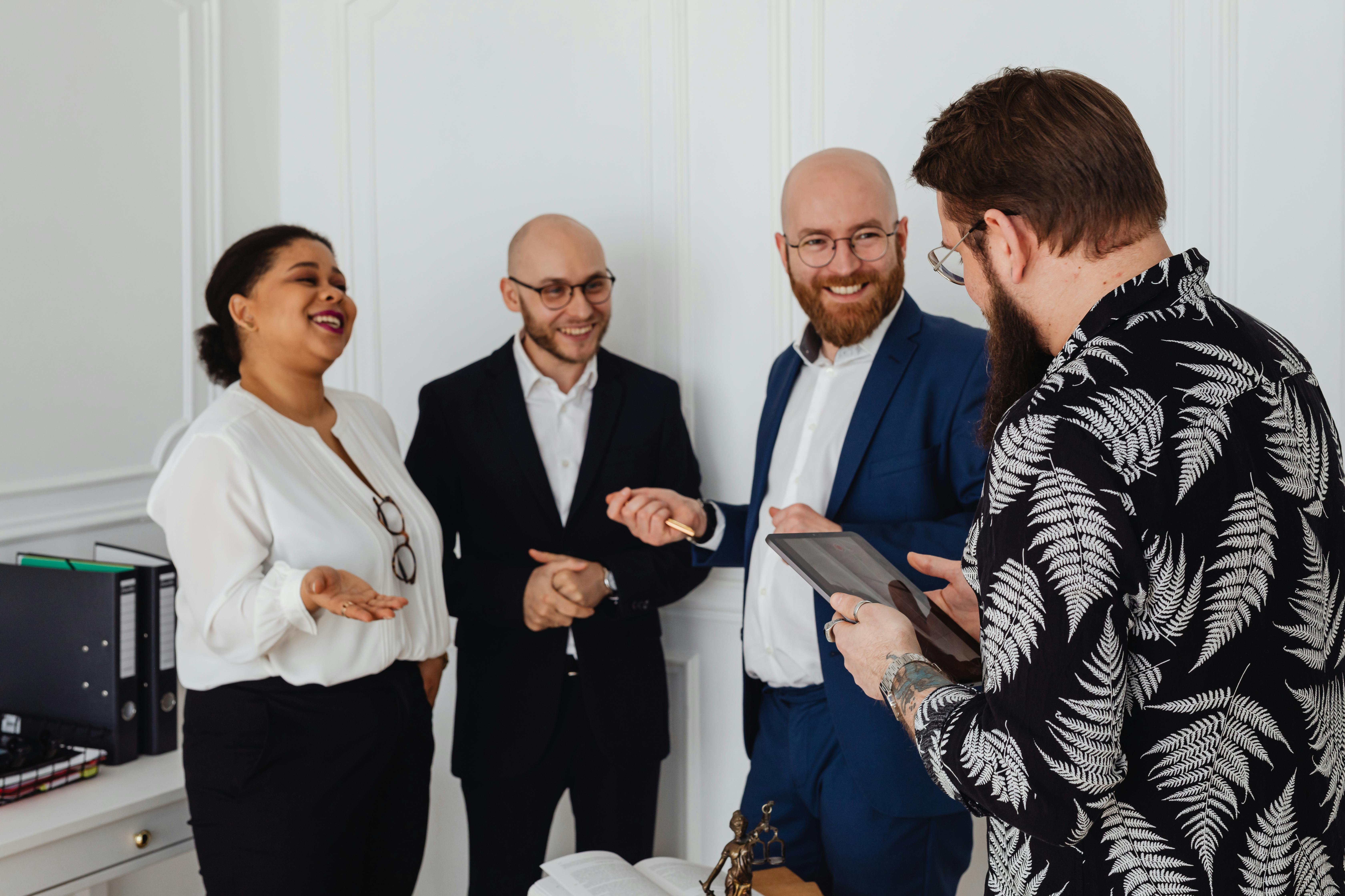Office Environment With Colleagues Engaging In Positive Communication And Teamwork