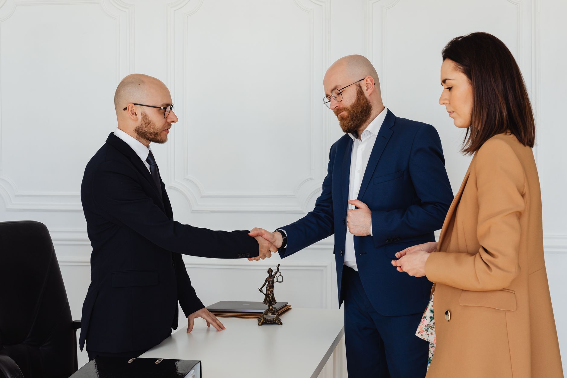 Women Shaking Hands in an Office
