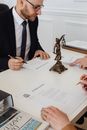 A Man Signing a Divorce Decree