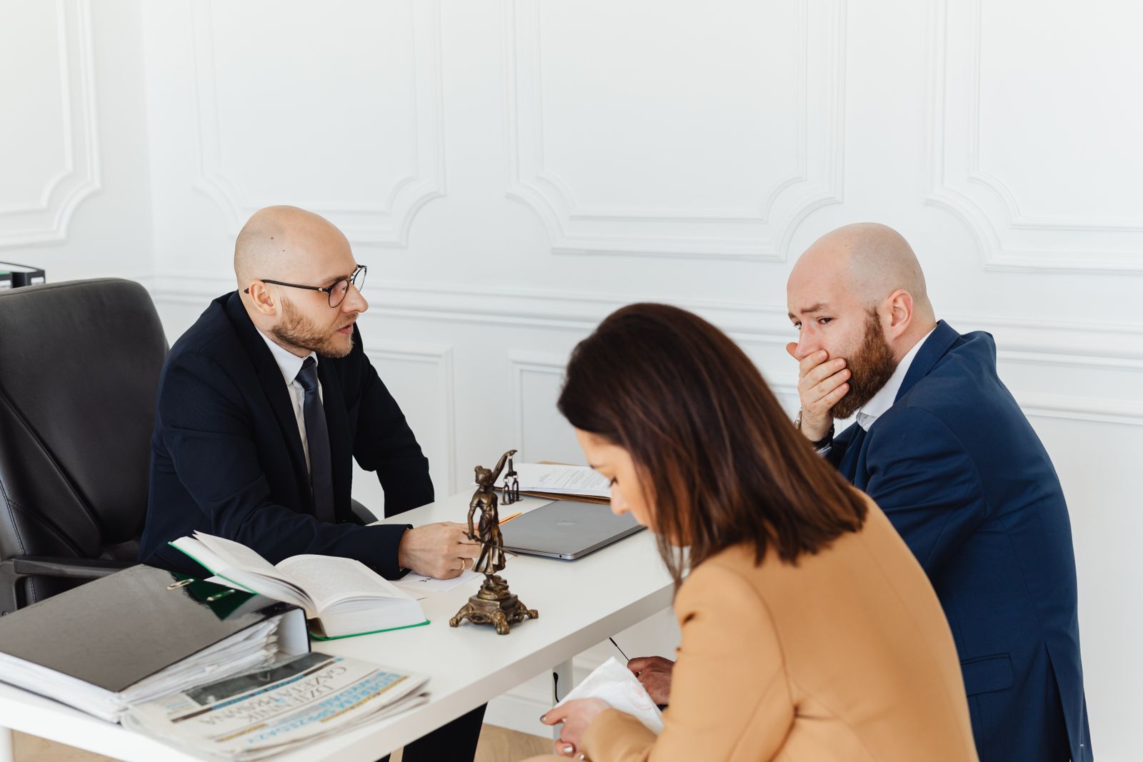 A serious conversation with a client across the desk
