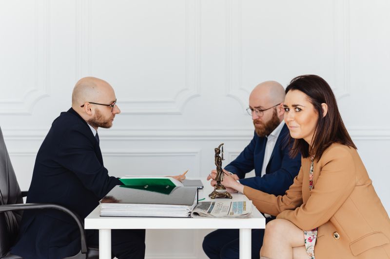 Professionals reviewing documents in an office