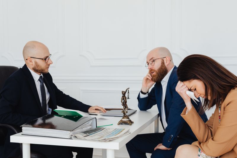 Professionals reviewing documents in an office