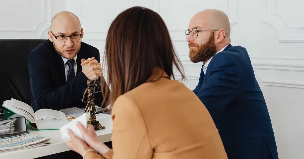 Lawyers in a professional discussion in a modern office