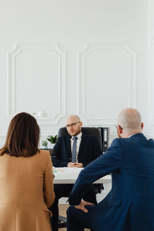 A lawyer discussing a case with a client.