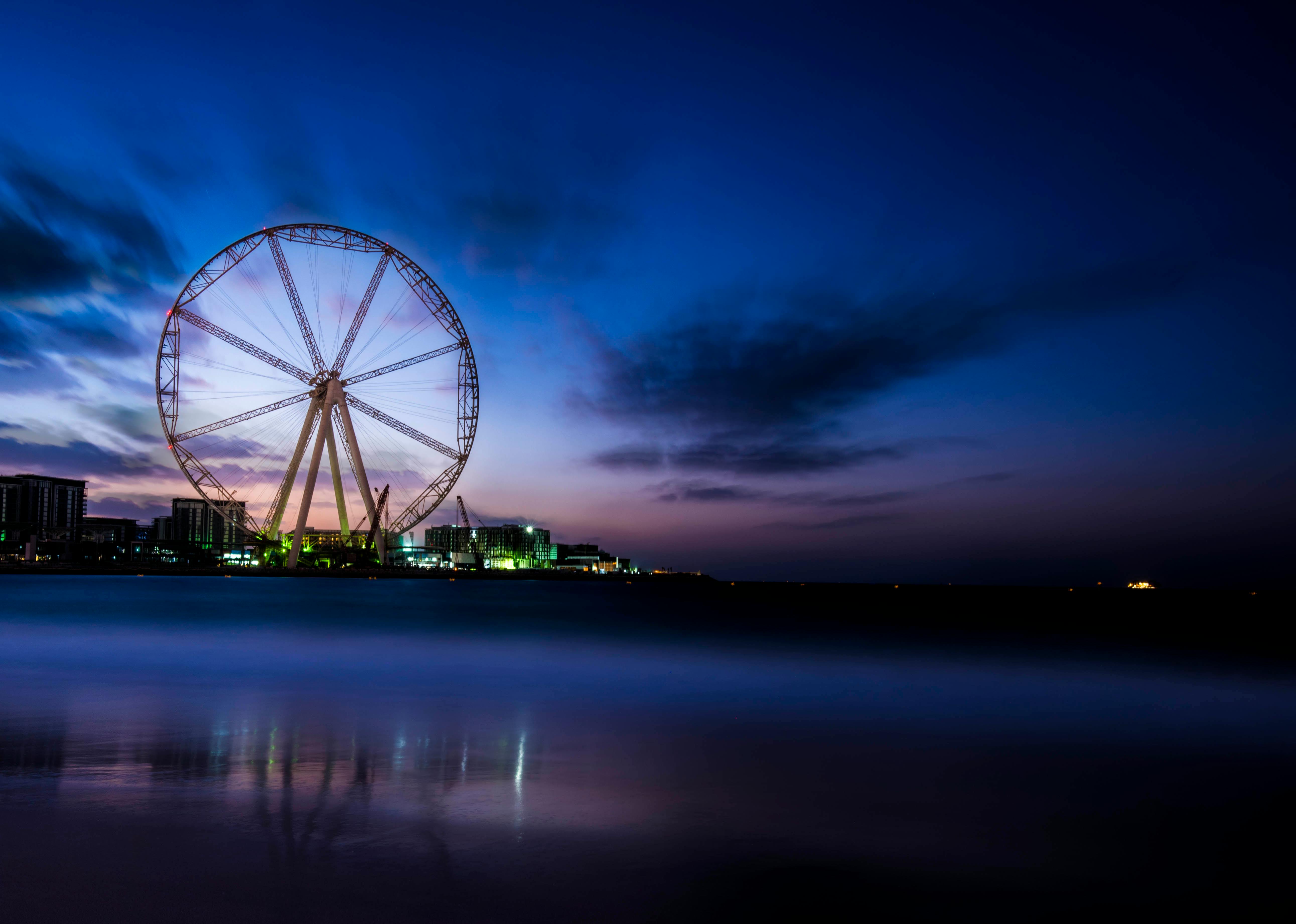 Photography Of Ferris Wheel Near Body Of Water · Free Stock Photo