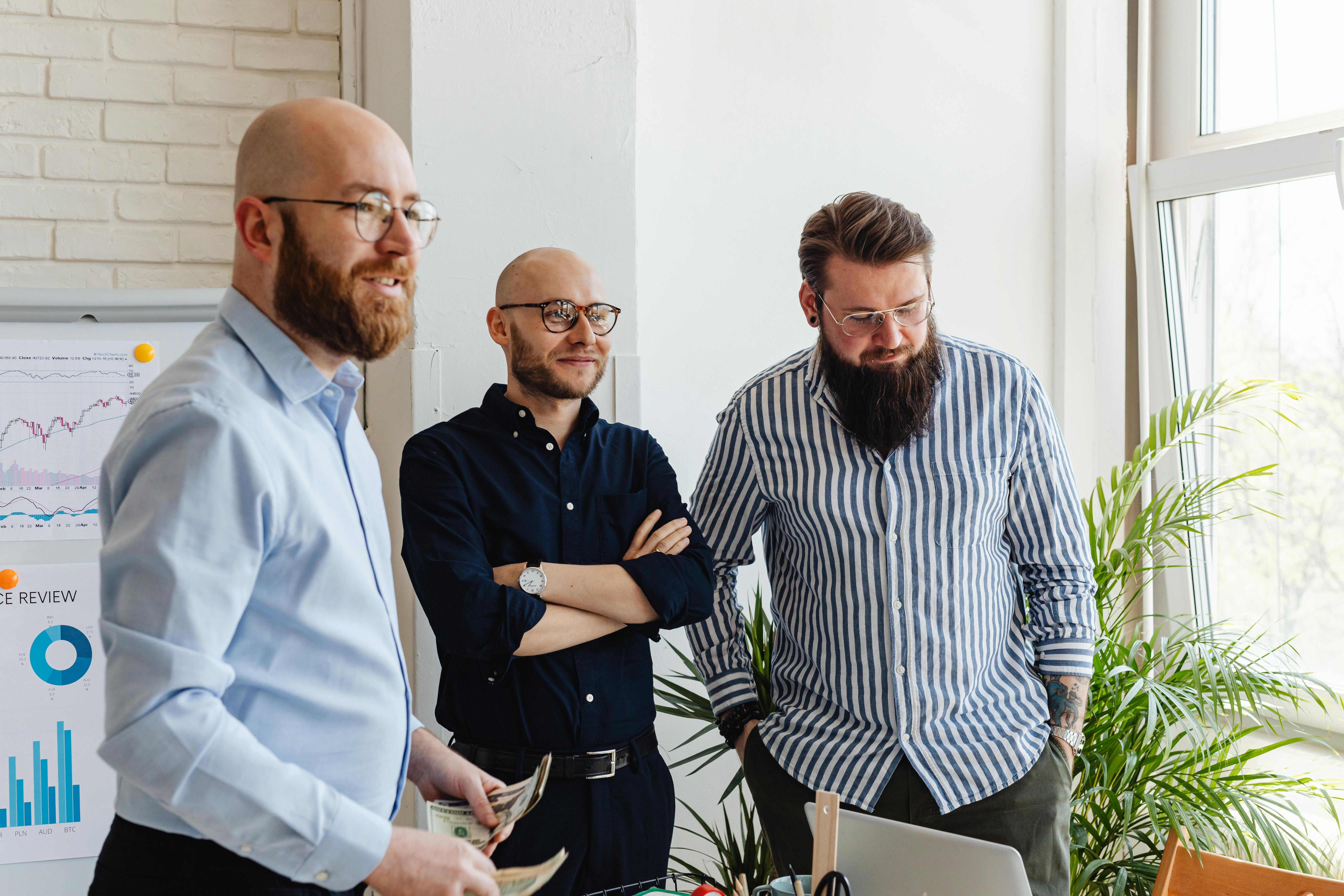 men in corporate attire at an office