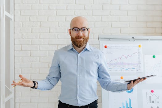 A businessman analyzing financial charts