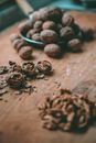 Brown and Black Seeds on Brown Wooden Table