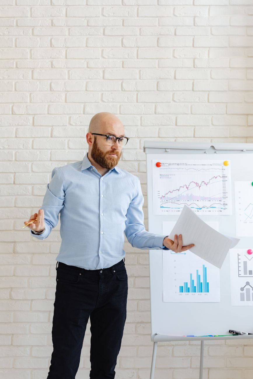 Executive presenting business performance charts