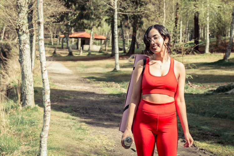 Woman Wearing Sport Clothing Between Trees