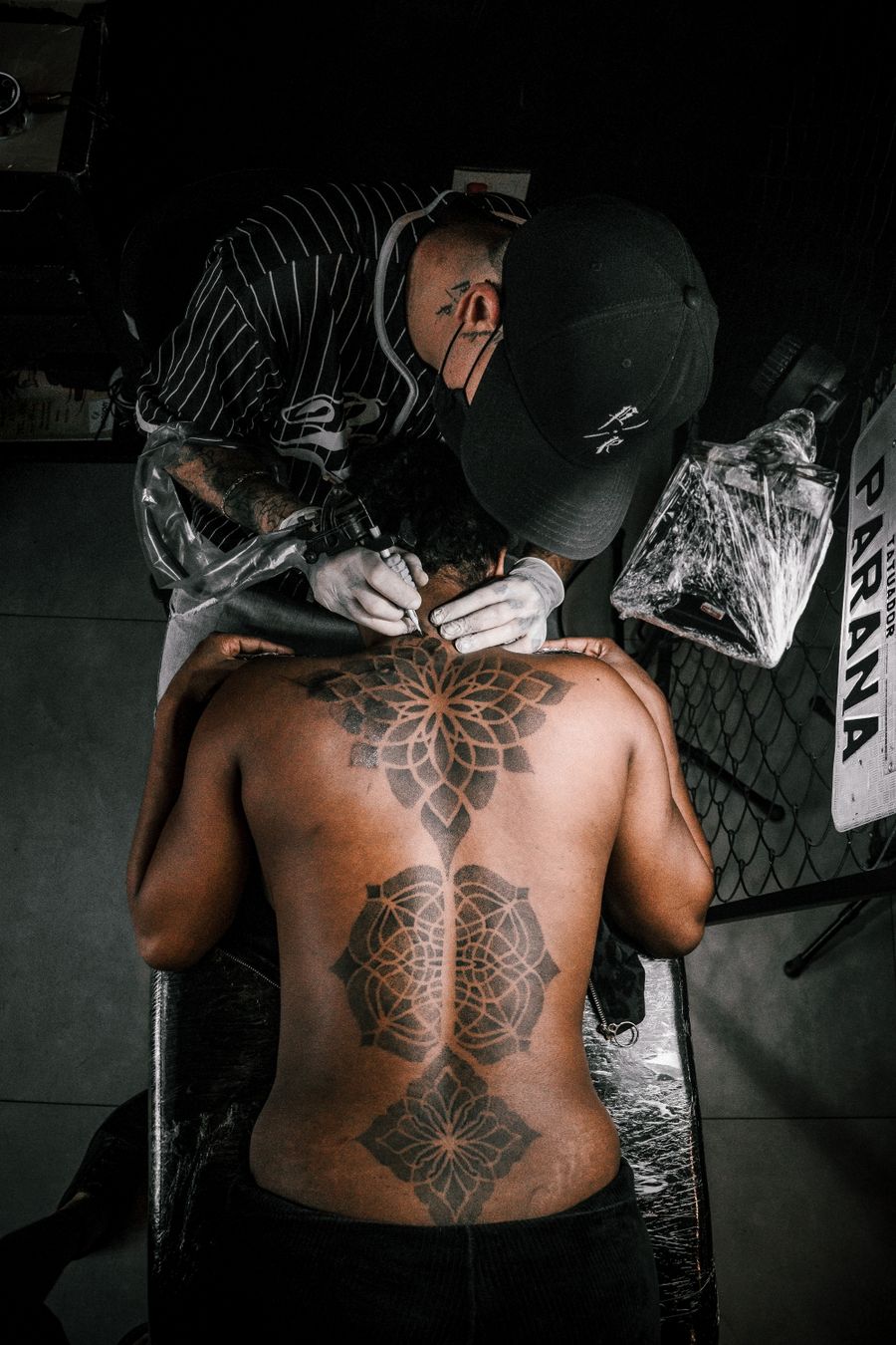 Geometric back tattoo in progress