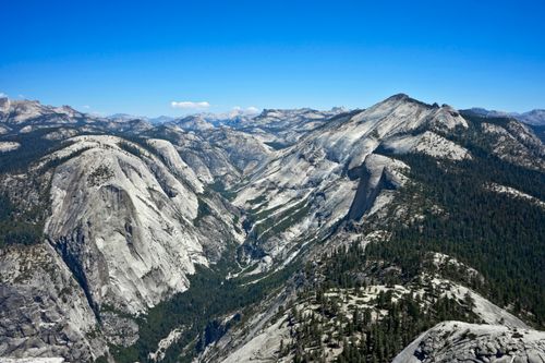Free Stunning aerial view of the granite peaks of Yosemite National Park, showcasing nature's grandeur. Stock Photo