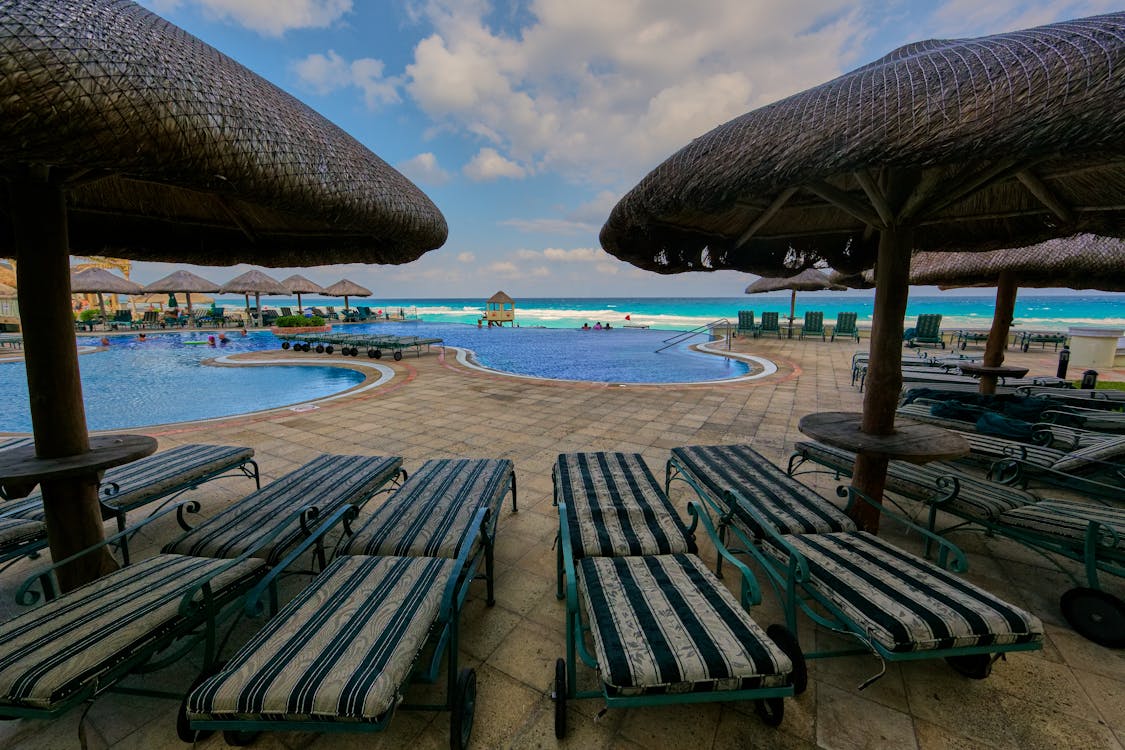 Bunch of Sun Lounger Near Pool