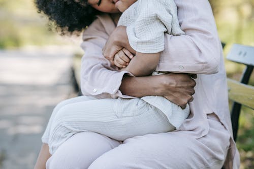 A Parent Hugging their Child