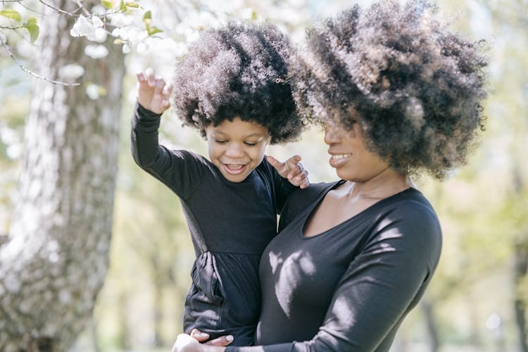 Mother And Daughter Wearing Matching Outfit 