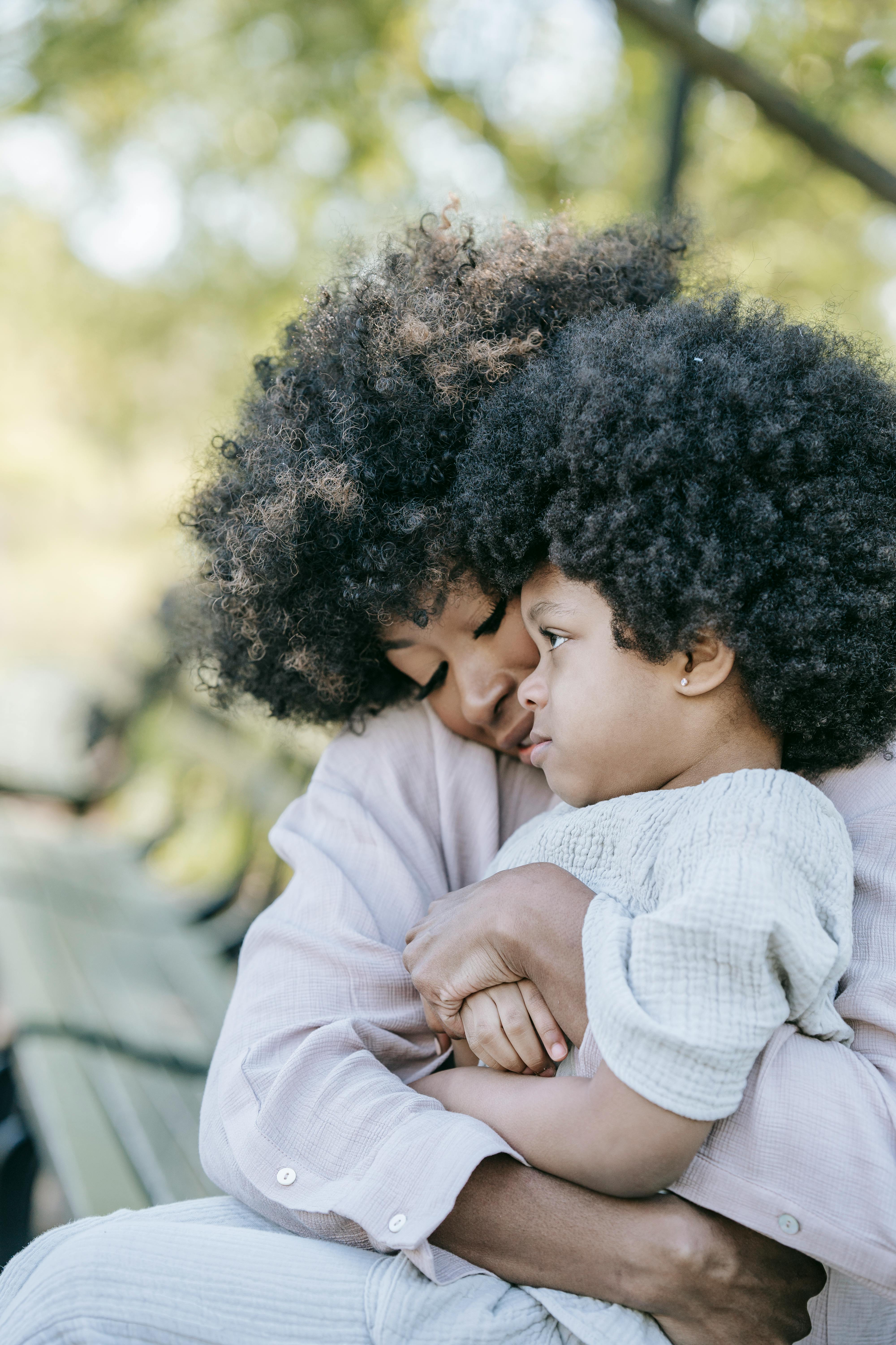 A Mother Hugging Her Child · Free Stock Photo