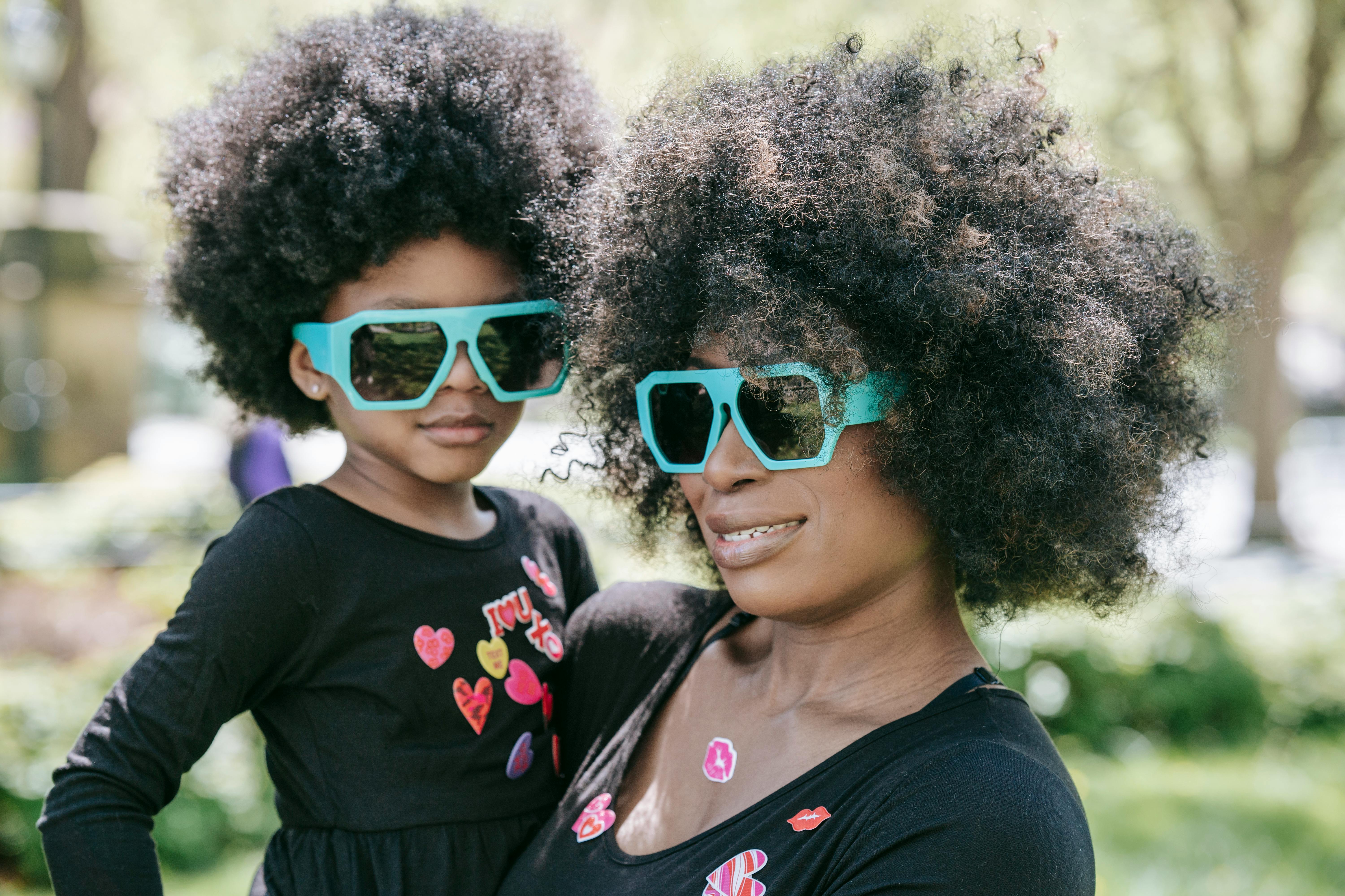 A close-up of a smartphone showing a data analytics dashboard with win rates and team composition stats