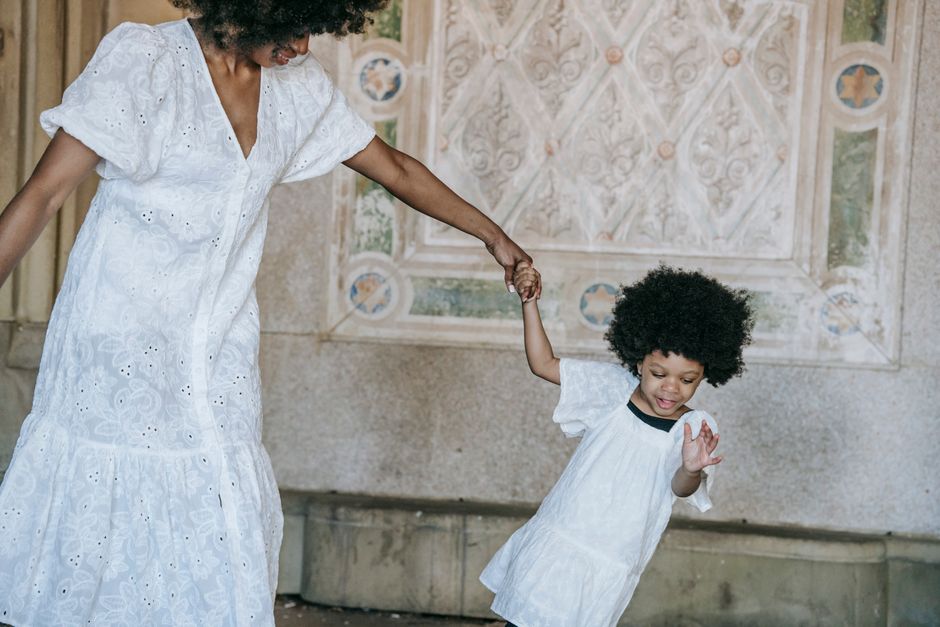 Woman in a white eyelet dress, the festive-accent 4th of July formula