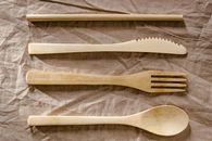 Brown Wooden Fork Lot on White Surface