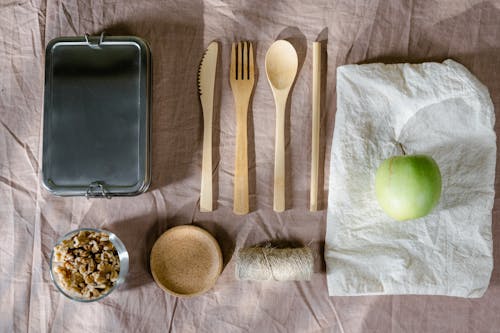 Lunch Box Set and Food on Brown Textile