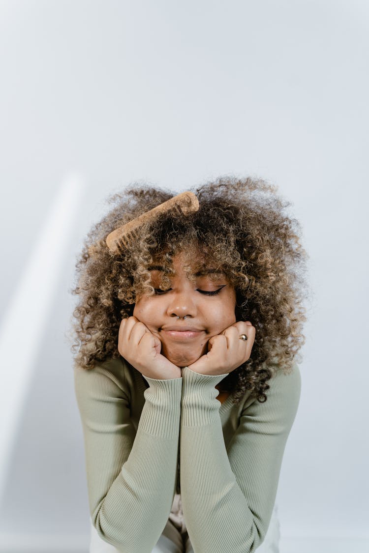 Close Up Photo Of Woman With Kinky Hair