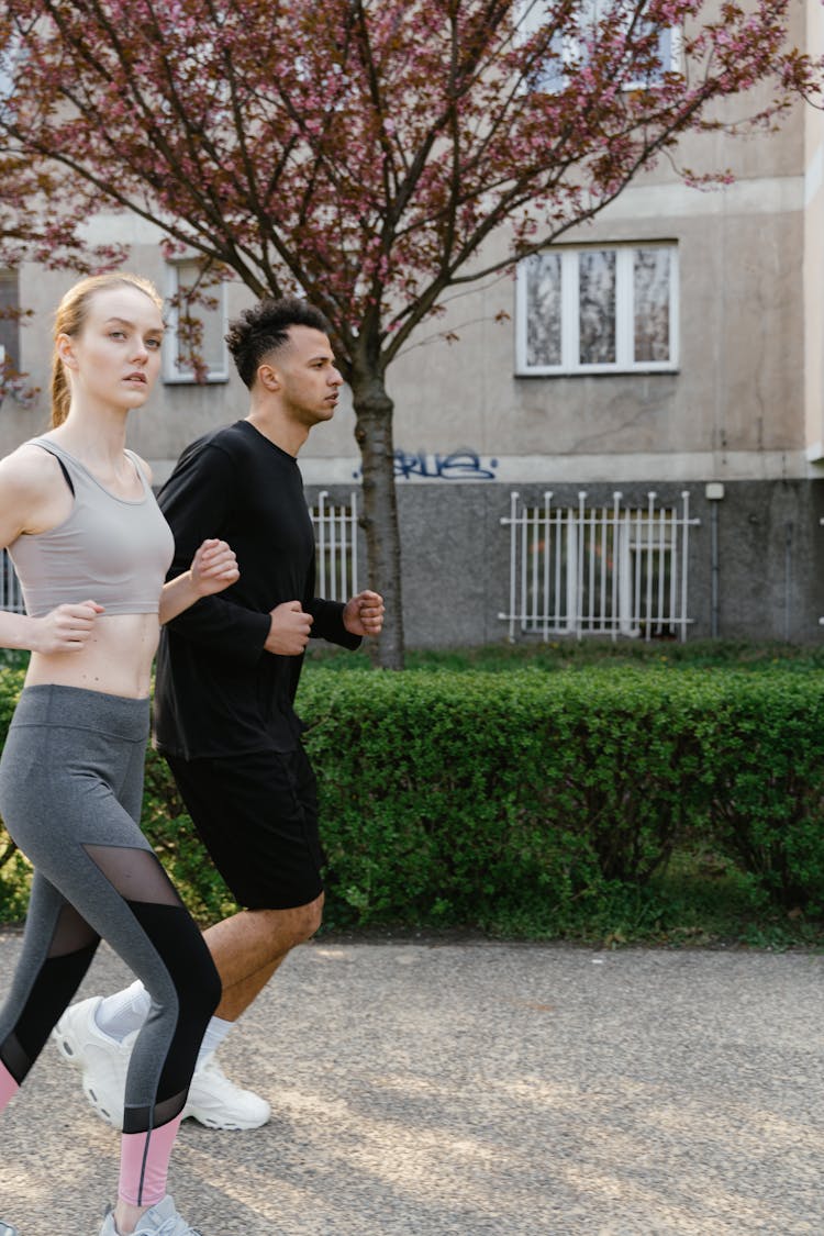 A Couple Jogging During The Day