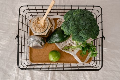 Free A basket of fresh produce and oats promoting a healthy and sustainable lifestyle. Stock Photo