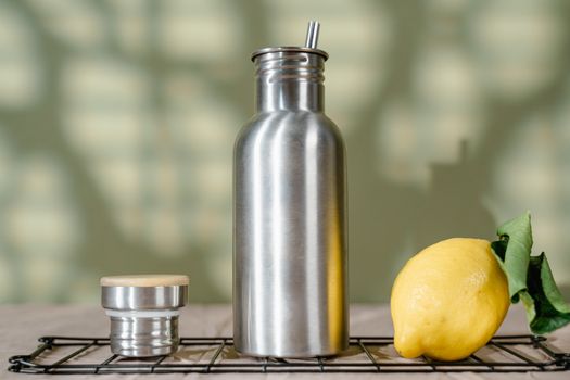 Stainless Steel Vacuum Flask on Yellow Fruit