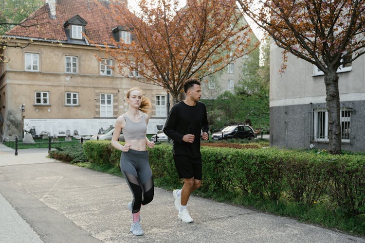 Man And Woman Running Together