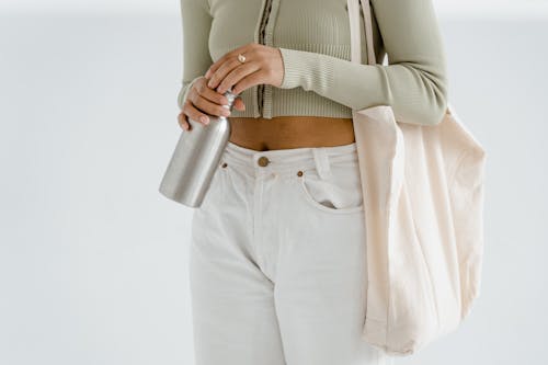 A Person Holding a Stainless Bottle