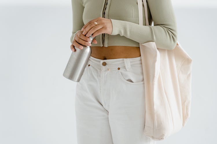 A Person Holding A Stainless Bottle