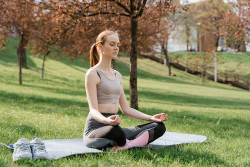Free A Woman Doing a Yoga Exercise Stock Photo