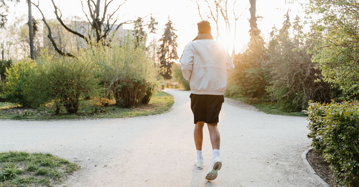 community run club meeting at sunrise in an urban park