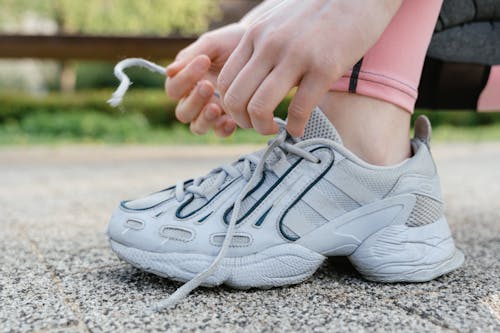 Person Wearing Gray Rubber Shoes