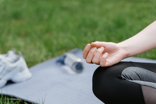 Close up of Woman Hand in Yoga Position