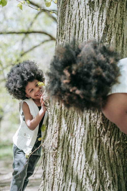 Free  Mother and Child Playing Hide and Seek  Stock Photo