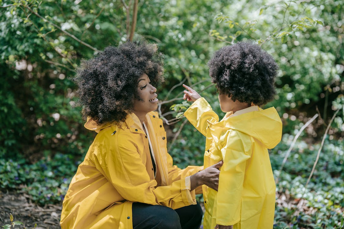 A Woman Talking to a Young Girl