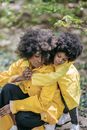 Girl in Yellow Jacket and Black Skirt