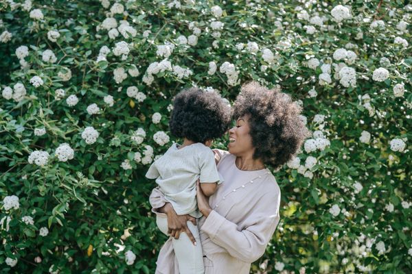 Mother embracing her child, raising emotionally healthy kids after divorce
